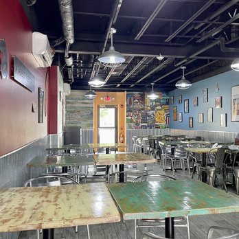 Izla - View down the length of the restaurant. - Puerto Rican Near Me - Fishkill, New York Izla - View down the length of the restaurant. - Puerto Rican Near Me - Fishkill, New York