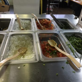 Chilangos - Fixings bar (onion, tomato and cilantro) - Mexican Near Me - Indianapolis, Indiana