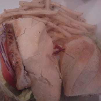 Tavira Restaurant - Pan seared fish sandwich with fries - Mediterranean Near Me - Chevy Chase, Maryland Tavira Restaurant - Pan seared fish sandwich with fries - Mediterranean Near Me - Chevy Chase, Maryland