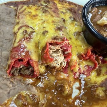 Blanco Cafe - Close up of beef, chicken & cheese enchiladas. - Mexican Near Me - San Antonio, Texas