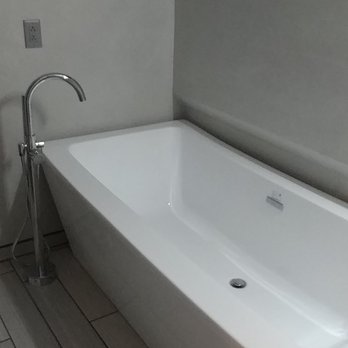 Advanced American Construction - New soaker tub and window. - Roofing Near Me - Corrales, New Mexico