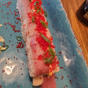 Moyashi - a sushi roll on a blue plate - Sushi Bars Near Me - Hanover, Indiana