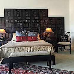 Bradley Interiors - Master bedroom with panels from Pier One-only looks expensive