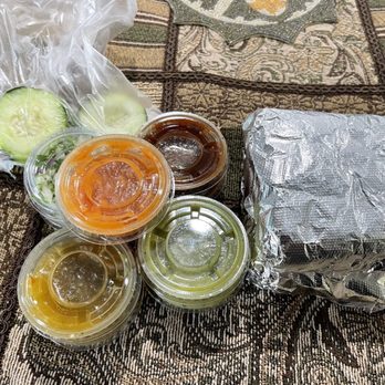 Tacos & Mariscos El Parque - a variety of condiments - Mexican Near Me - Gardena, California