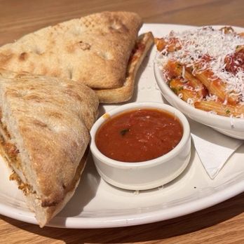 Carrabba's Italian Grill - Chicken parmigiana sandwich with penne pomodoro - Italian Near Me - Davenport, Florida Carrabba's Italian Grill - Chicken parmigiana sandwich with penne pomodoro - Italian Near Me - Davenport, Florida