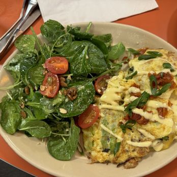 Snooze, an A.M. Eatery - Crab and asparagus omelette with spinach salad. - Breakfast & Brunch Near Me - Nashville, Tennessee