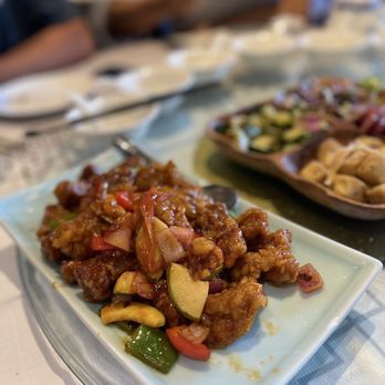 Ming Cuisine - two plates of food on a table - Chinese Near Me - Richmond Hill, Ontario Ming Cuisine - two plates of food on a table - Chinese Near Me - Richmond Hill, Ontario