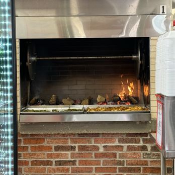 Chicken Pullita - Fire pit where chicken are roasted - Chicken Shop Near Me - Saginaw, Texas Chicken Pullita - Fire pit where chicken are roasted - Chicken Shop Near Me - Saginaw, Texas