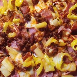 Domino's Pizza - Picture of my custom thin-crust pizza with pineapple, extra bacon, extra ham, and banana peppers!  Yummmmmm!