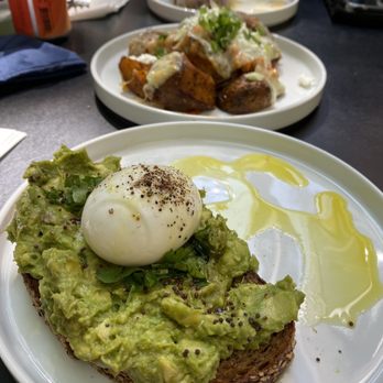 Mr West Cafe Bar Downtown - Avocado Toast w poached egg - Bars Near Me - Seattle, Washington