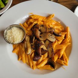 Penne with tomato sauce, mushrooms, and mozzarela. It sure didn't look or taste like mozzarela. edible. Penne with tomato sauce, mushrooms, and mozzarela. It sure didn't look or taste like mozzarela. edible.