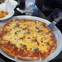 Thin crust sausage pizza Thin crust sausage pizza