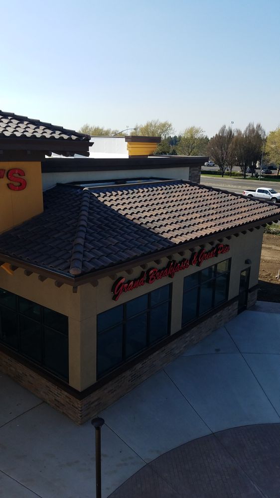 Slide of Vernon Roofing