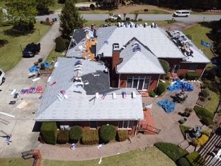 Slide of Robin Hood Roofing