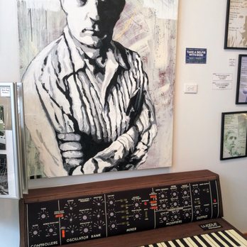 Moogseum - piano couch with a painting of the master himself - Museums Near Me - Asheville, North Carolina