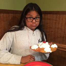 My daughter enjoying her sopapilla. My daughter enjoying her sopapilla.