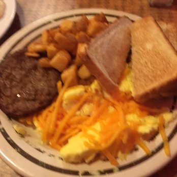 The Log Cabin BBQ - Scrambled eggs and cheese, potatoes, sausage patty, toast - Barbeque Near Me - Labelle, Florida The Log Cabin BBQ - Scrambled eggs and cheese, potatoes, sausage patty, toast - Barbeque Near Me - Labelle, Florida