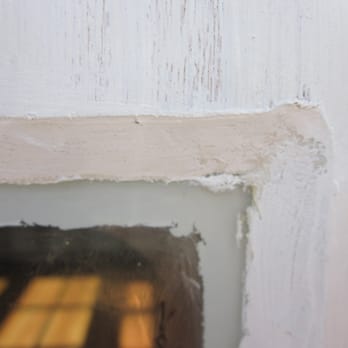 415 Design+Build - Putty, rather than wood trim, used to hold a window in place. Uneven and visible from the other side. - General Contractors Near Me - Brisbane, California
