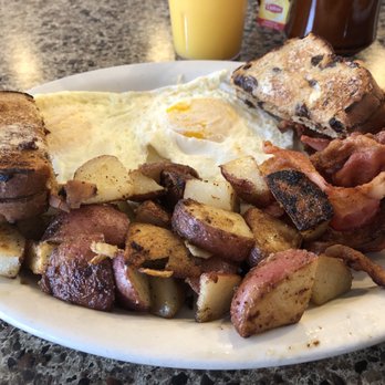 The Peabody Diner - Hungry man eggs over medium, bacon and raisin toast - Breakfast & Brunch Near Me - Peabody, Massachusetts The Peabody Diner - Hungry man eggs over medium, bacon and raisin toast - Breakfast & Brunch Near Me - Peabody, Massachusetts