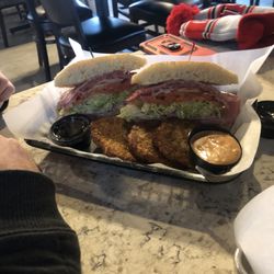 The Eatery Deli & Sandwich Shopp - Italian Sub with Potato Pancakes on the side
