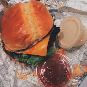 Baby's - Smash burger with vegan cheese and a side of ketchup and white sauce - American Near Me - Indianapolis, Indiana