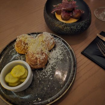 Stubborn Seed - Cacio e Pepe Cheesy Puffs and Can't remember the other ones. - New American Near Me - Las Vegas, Nevada Stubborn Seed - Cacio e Pepe Cheesy Puffs and Can't remember the other ones. - New American Near Me - Las Vegas, Nevada