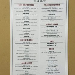 The District on Pine - Food menu posted in the bathroom