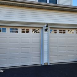 Bay To Bay Garage Doors - New two layer garage doors, Almond color, and upgraded to torsion systems for reliability.