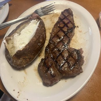 Texas Roadhouse - Hand cut New York strip steak and baked potato. - Barbeque Near Me - Bellingham, Washington Texas Roadhouse - Hand cut New York strip steak and baked potato. - Barbeque Near Me - Bellingham, Washington