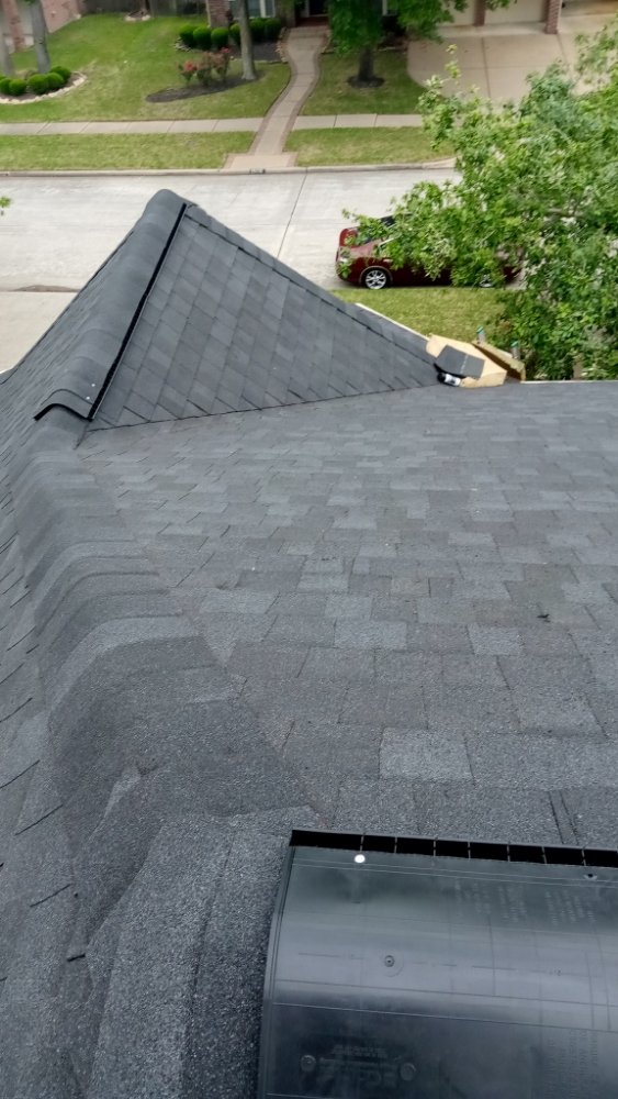 Slide of Refined Roofing & Construction