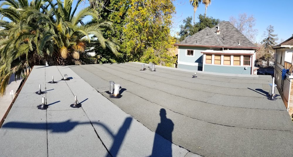 Slide of Trio Roofing Contractors