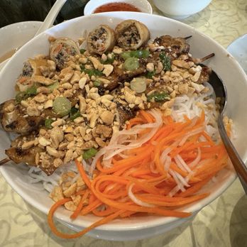 Saigon Kitchen - Grilled meat with egg rolls over rice vermicelli. - Vietnamese Near Me - San Jose, California Saigon Kitchen - Grilled meat with egg rolls over rice vermicelli. - Vietnamese Near Me - San Jose, California