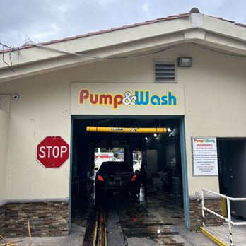 Pump & Munch - a car in a garage - Car Wash Near Me - Oakland Park, Florida Pump & Munch - a car in a garage - Car Wash Near Me - Oakland Park, Florida