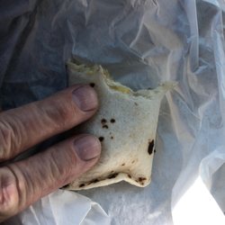 Lalo's Food Mart & Liquors - $6.00 handmade burrito. And no green chili in it. No meat, worse than McDonalds.
