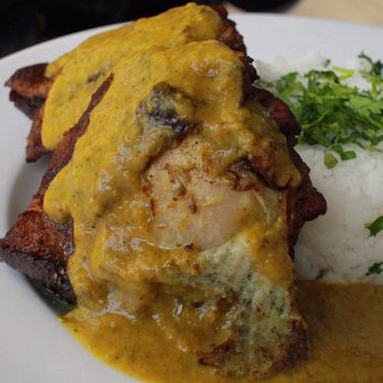 Caves Corvallis - Chicken and apricot tagine with basmati rice and paprika oil - Beer Bar Near Me - Corvallis, Oregon