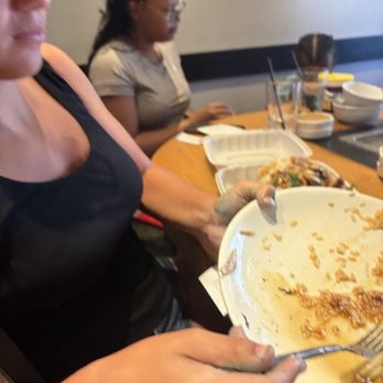 Benihana - Torrance - Fly on my daughter's plate and on the cup - Sushi Bars Near Me - Torrance, California