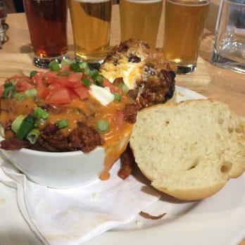 Taps Brewhouse - Chili cheese burger and chili cheese poutine with beer flight. - Pubs Near Me - Niagara Falls, Ontario Taps Brewhouse - Chili cheese burger and chili cheese poutine with beer flight. - Pubs Near Me - Niagara Falls, Ontario