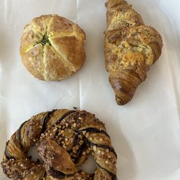 Garlic cream cheese pastry, garlic and cheese croissant and chocolate pretzel Garlic cream cheese pastry, garlic and cheese croissant and chocolate pretzel