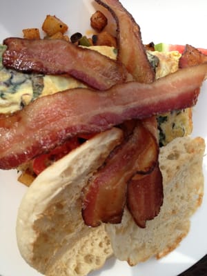 Photo of Roots Restaurant & Cellar - Milwaukee, WI, US. Omelet special with bacon and an English muffin. Great brunch option!