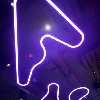 F1 Arcade - All the lights overhead are shaped like different grand prix tracks. - Arcades Near Me - Washington, DC, District of Columbia