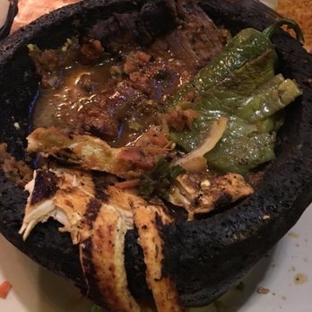Chonitos Mexican Restaurant - What's left of the Molcajete $29.99 for 2 ppl with tortillas and 2 orders rice and beans. Delicious - Mexican Near Me - Alhambra, California