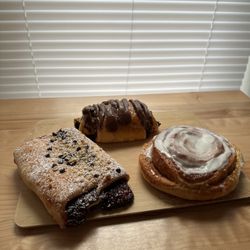 Cinnamon roll plus 2 others that I didn't catch the name of