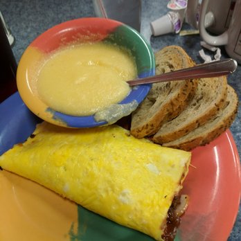 Cosmic Omelet - The McOmelette - essentially a cheeseburger omelette. Grits and rye too. - Breakfast & Brunch Near Me - Manchester, Connecticut Cosmic Omelet - The McOmelette - essentially a cheeseburger omelette. Grits and rye too. - Breakfast & Brunch Near Me - Manchester, Connecticut
