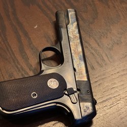 Finks Custom Gunsmithing - Colt 1903 case hardened refinish.