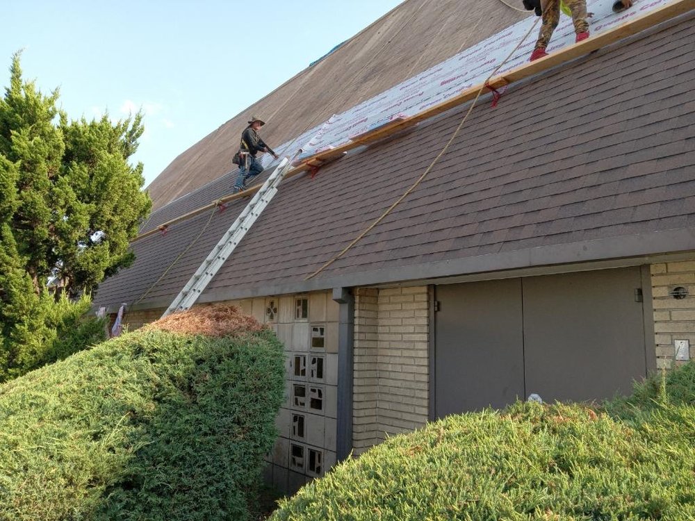 Slide of Reno's Roofing