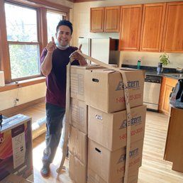 Lugging up the boxes!