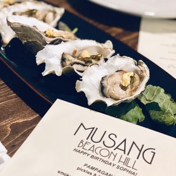 Musang Seattle - Oysters with an amazing garlic oil - Filipino Near Me - Seattle, Washington Musang Seattle - Oysters with an amazing garlic oil - Filipino Near Me - Seattle, Washington