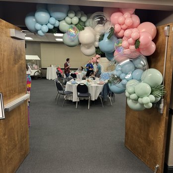 Happy28 - Entrance of baby shower with candy cart in back - Party Equipment Rentals Near Me