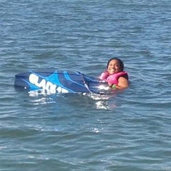 Allen's Aquatic Adventures - Allen teaching Camille how to Wake Board. - Tubing Near Me - Gulfport , Florida
