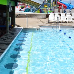 The Watering Hole Safari and Waterpark at Monsoon Lagoon - Tiki Swim Up Bar